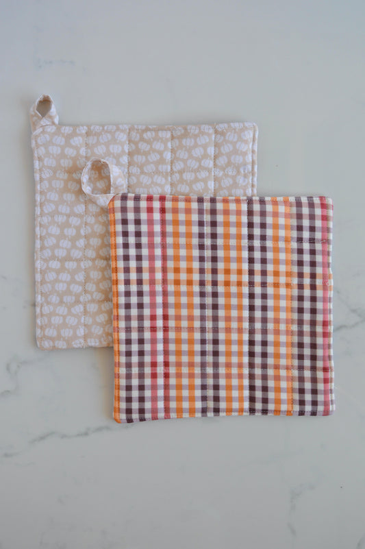 set of 2 matching reversible pumpkin plaid design potholders